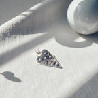 Colgante Corazón con textura y pelotas de plata